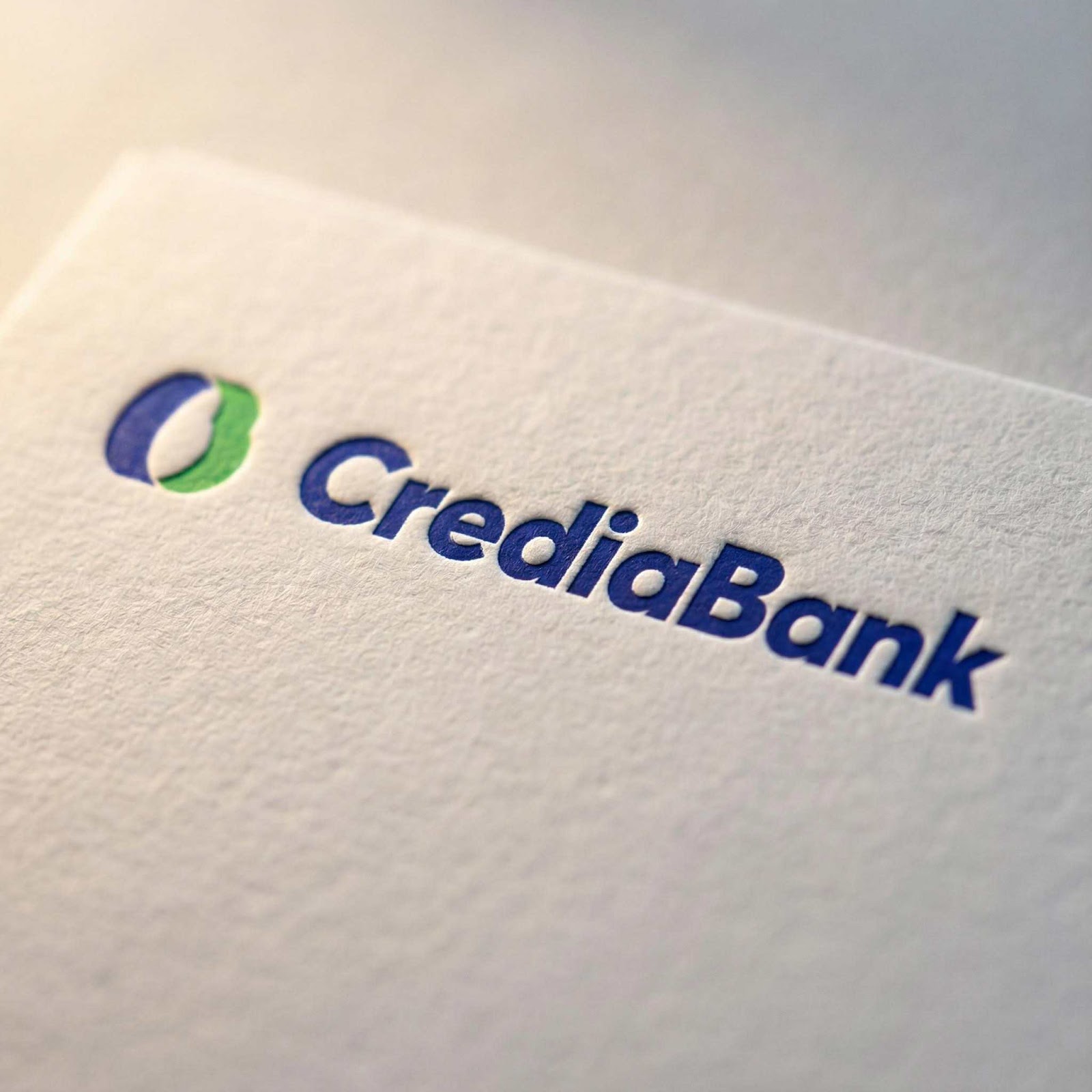 CampaignsLive AI financial services creative — premium brand identity letterpress close-up